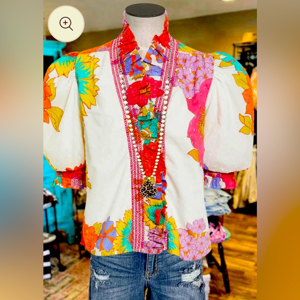 V neck ruffle neck puff sleeve top.